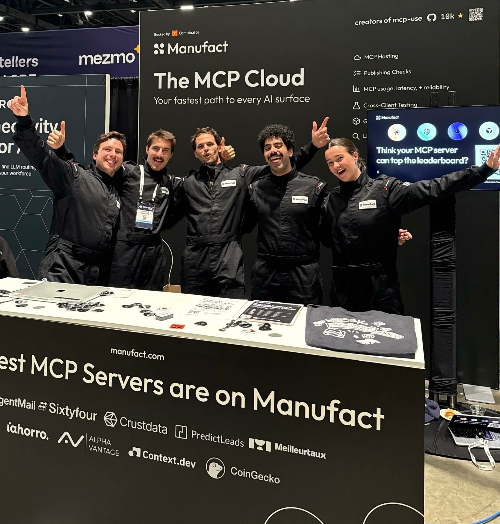 All five Manufact teammates together at the Manufact conference booth